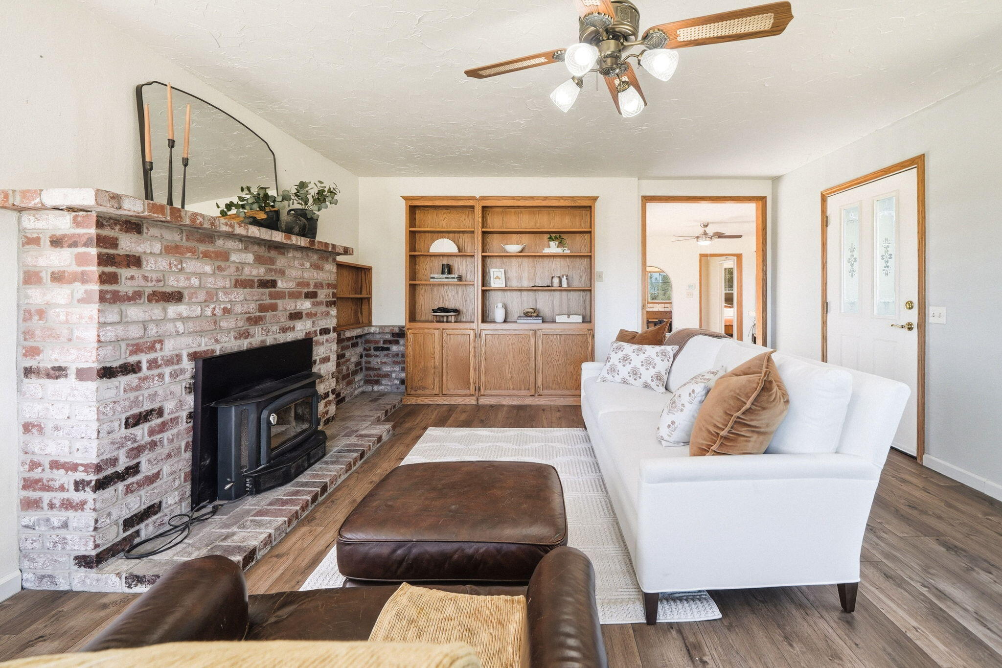 5941 Oak Street Anderson, CA 96007 - Photo 4 of 14 a living room with furniture and a fireplace