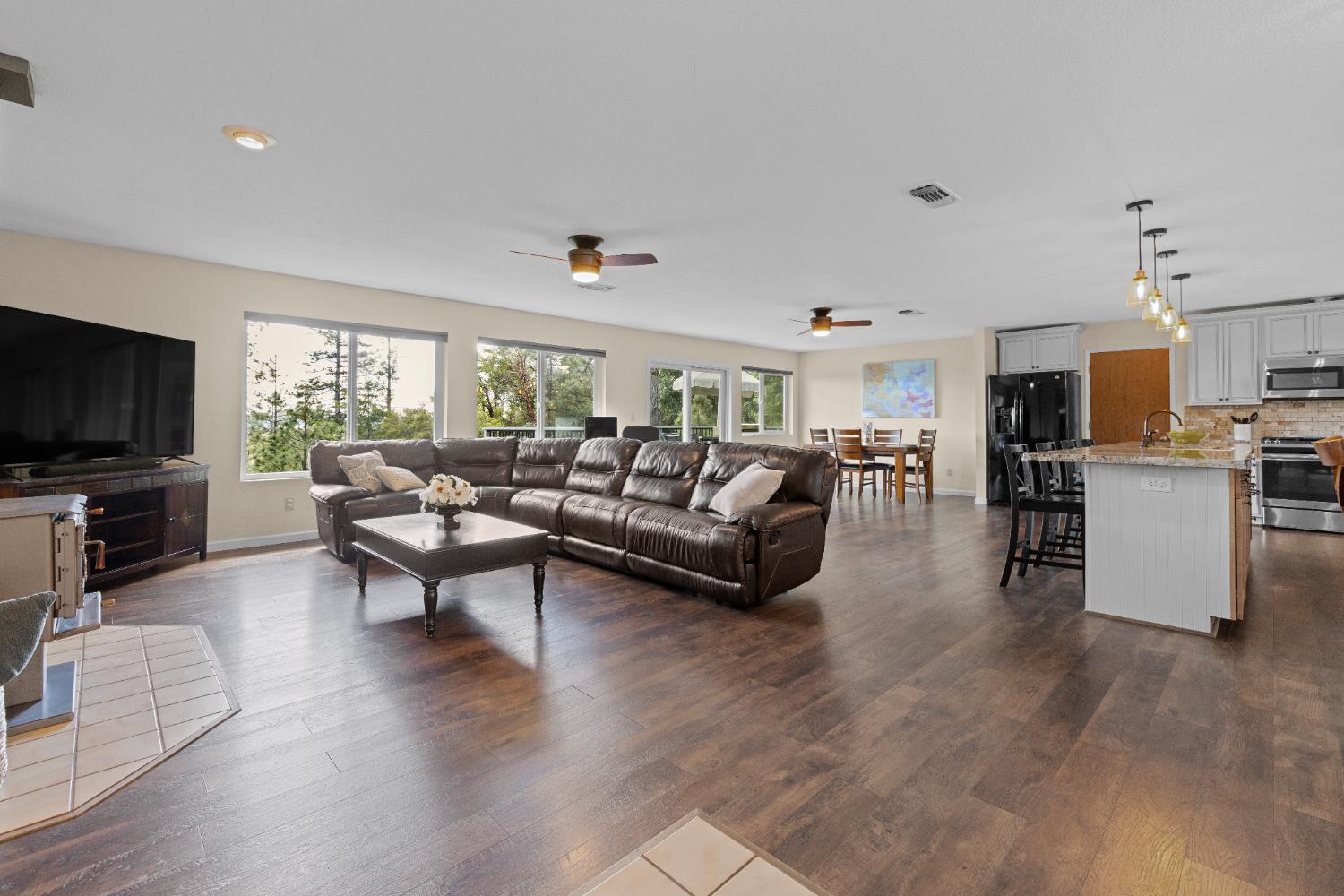6139 Green Ridge Drive Foresthill, CA 95631 - Photo 12 of 30 a living room with fireplace furniture and a flat screen tv