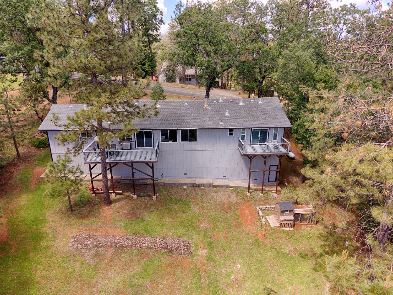 6139 Green Ridge Drive Foresthill, CA 95631 - Photo 29 of 30 a aerial view of a house with swimming pool and sitting area