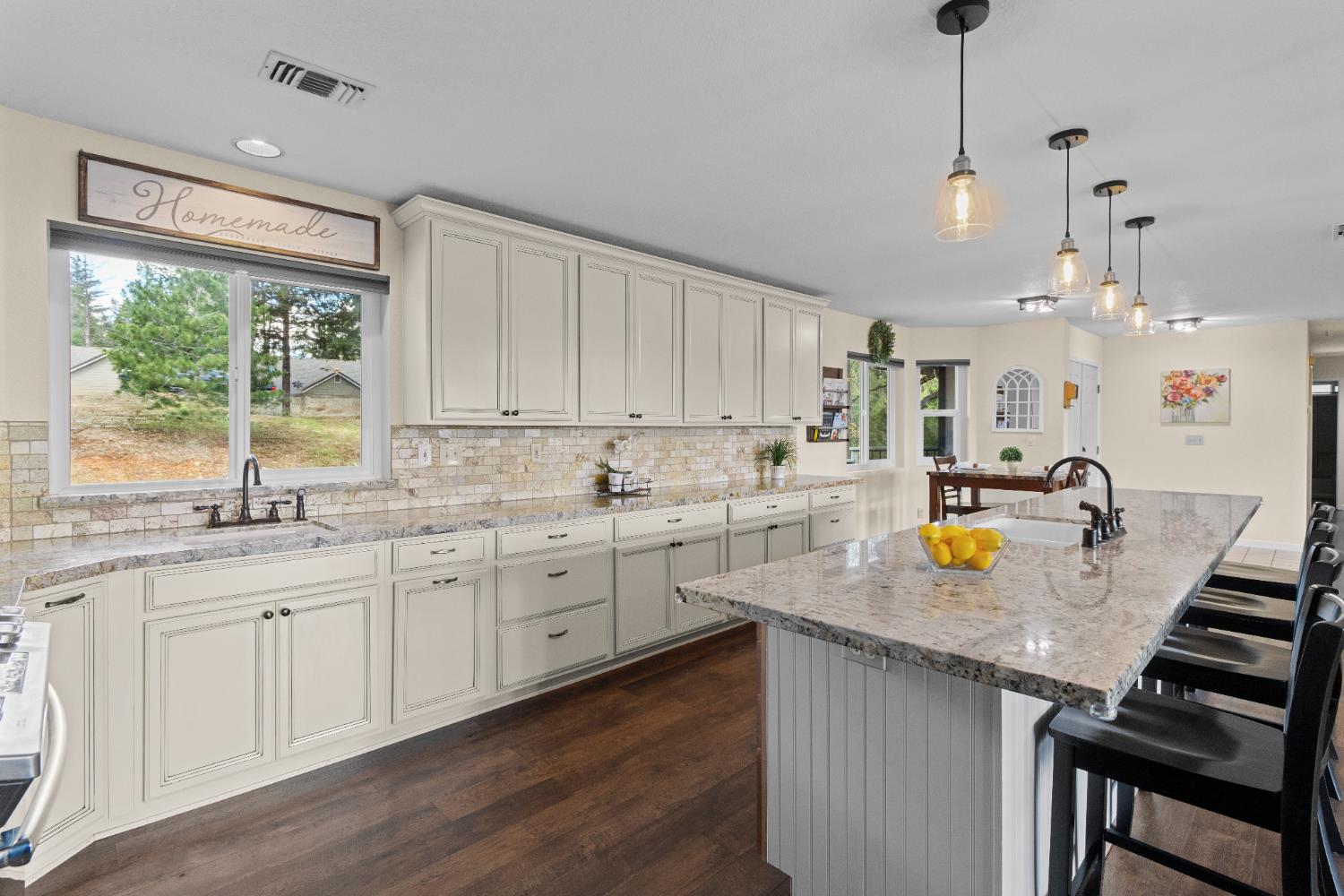6139 Green Ridge Drive Foresthill, CA 95631 - Photo 5 of 30 a kitchen with sink cabinets and wooden floor