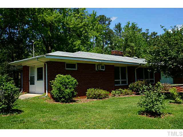 Side of property.  This area has been renovated to a bonus room!
