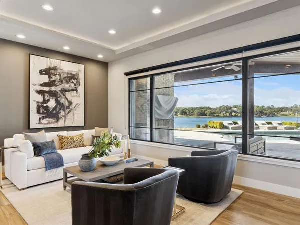 a large kitchen with a table and chairs