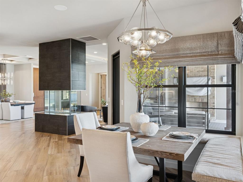 22151 Lake Seneca Road Eustis, FL 32736 - Photo 22 of 77 a view of a dining room with furniture and window