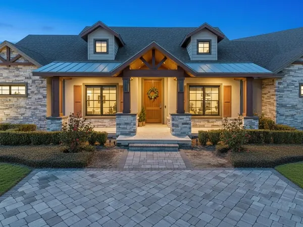 a front view of a house with a porch