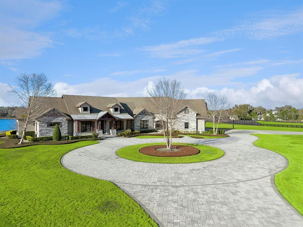 22151 Lake Seneca Road Eustis, FL 32736 - Photo 67 of 77 a front view of a house with a yard