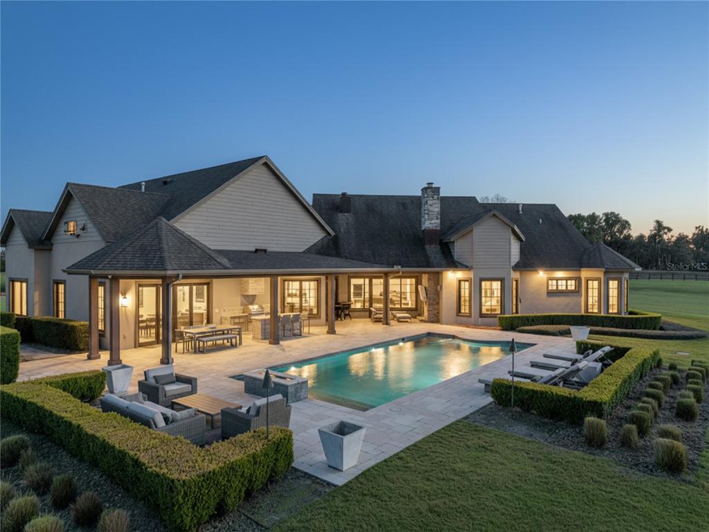 22151 Lake Seneca Road Eustis, FL 32736 - Photo 7 of 77 a front view of a house with garden