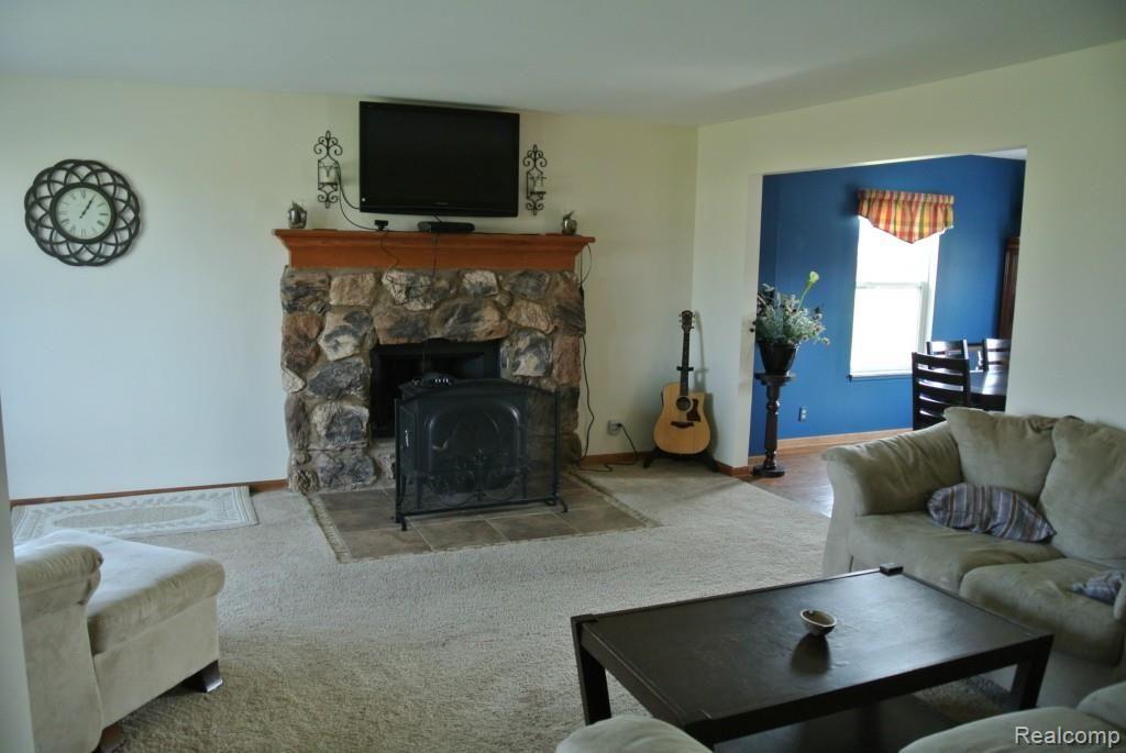 8772 Almont Road Almont, MI 48003 - Photo 7 of 10 Fire Place Living Room.