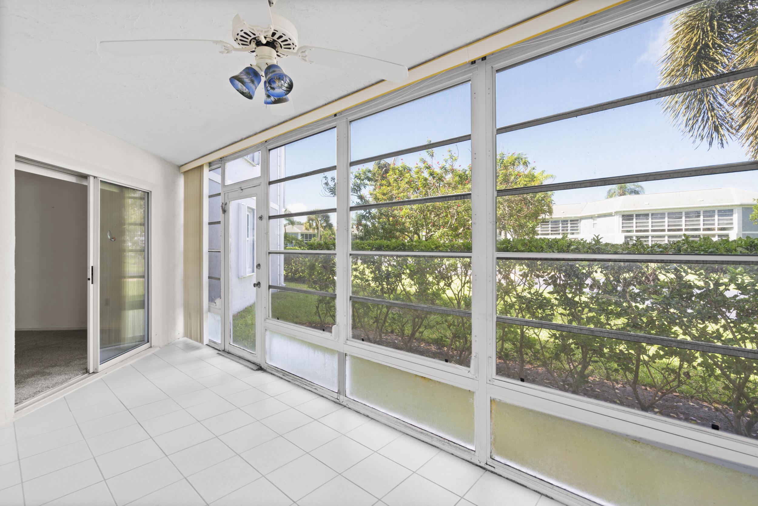 3278 Southeast Aster Lane, Unit F155 Stuart, FL 34994 - Photo 15 of 41 a view of an empty room with a window