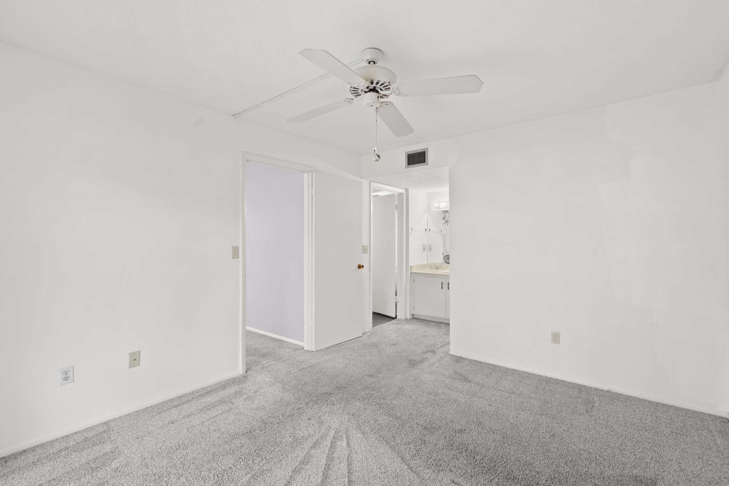 3278 Southeast Aster Lane, Unit F155 Stuart, FL 34994 - Photo 22 of 41 a view of a room with a ceiling fan