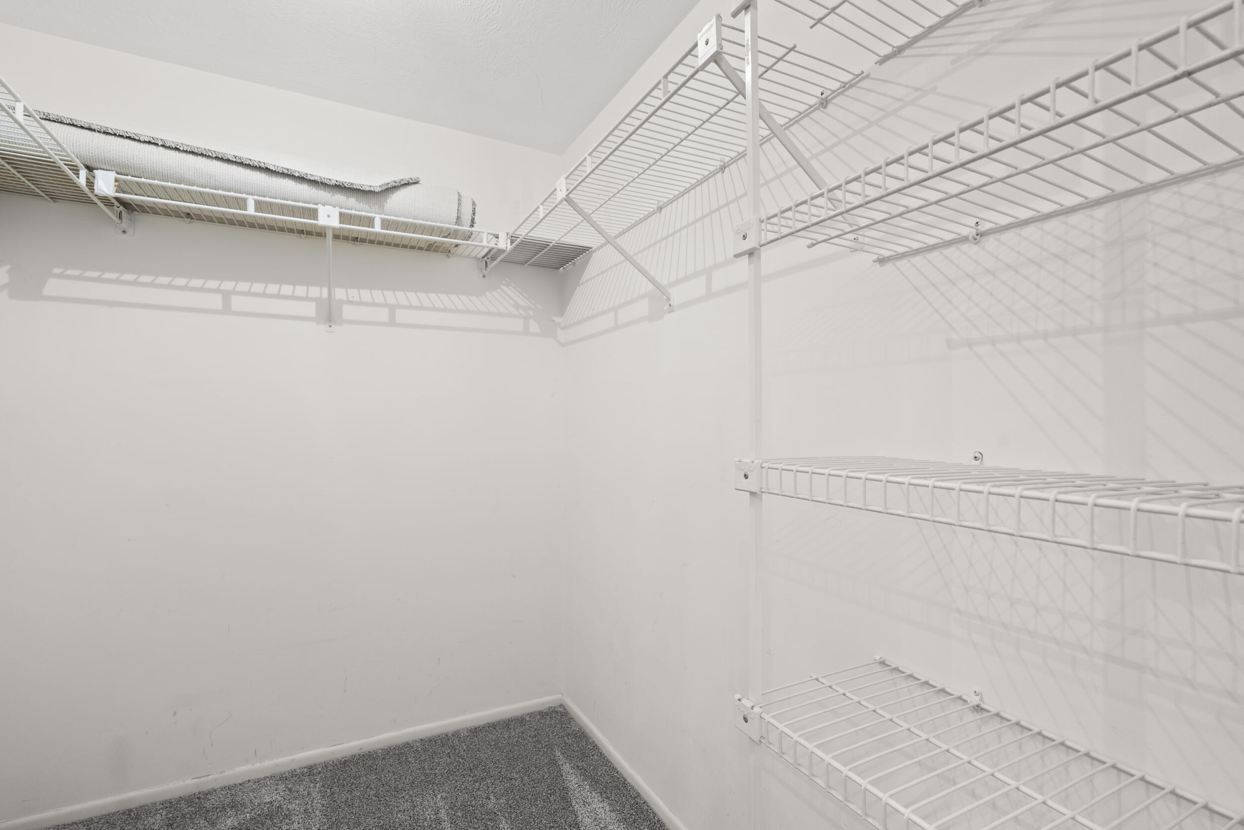 3278 Southeast Aster Lane, Unit F155 Stuart, FL 34994 - Photo 26 of 41 a view of a room with racks on the wall