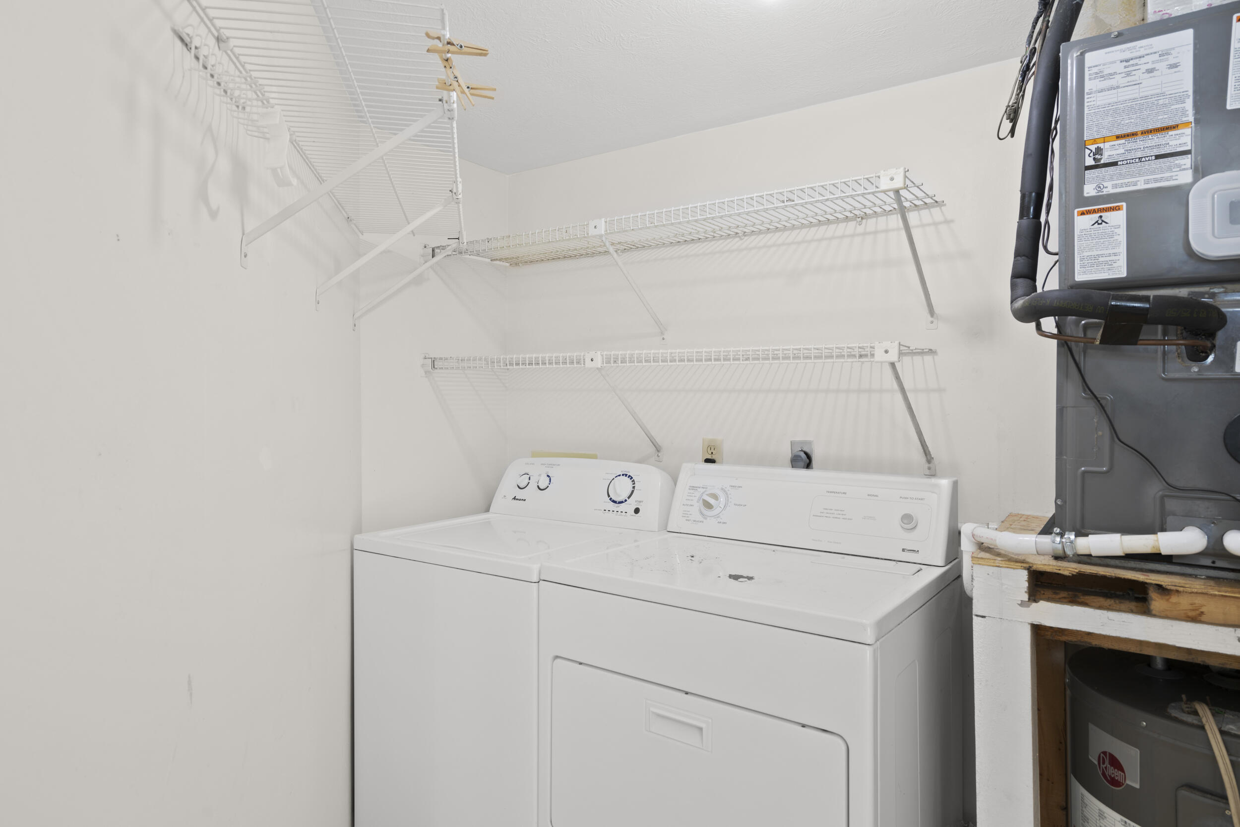 3278 Southeast Aster Lane, Unit F155 Stuart, FL 34994 - Photo 27 of 41 a utility room with dryer and washer
