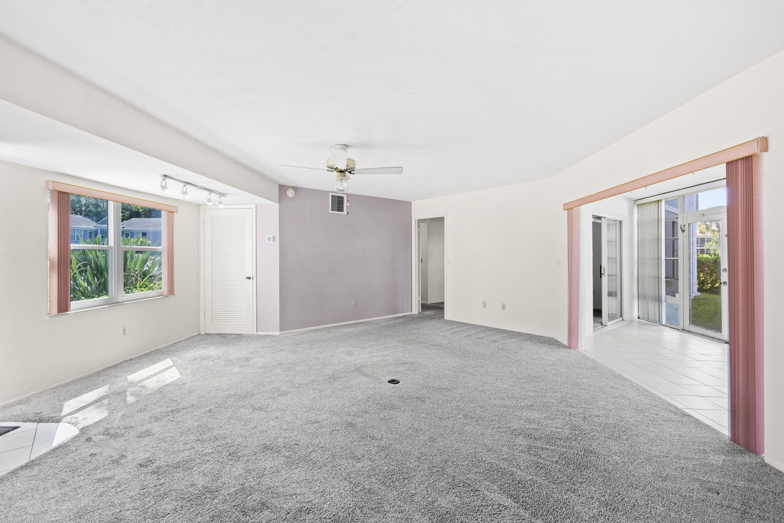 3278 Southeast Aster Lane, Unit F155 Stuart, FL 34994 - Photo 7 of 41 an empty room with windows and closet