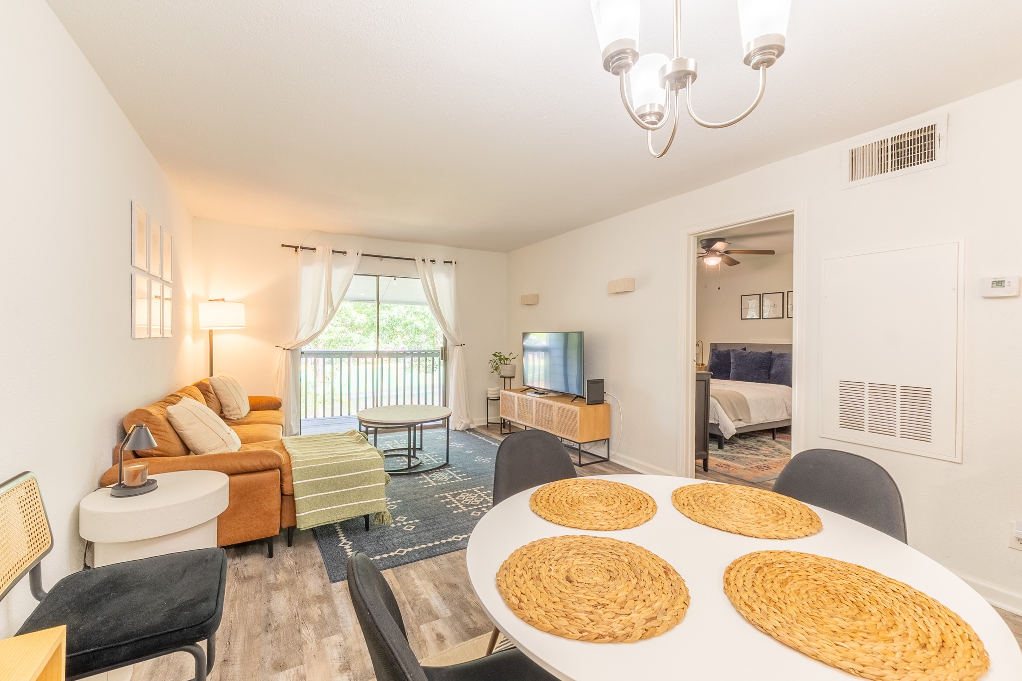 13151 Walden Road, Unit 132 Montgomery, TX 77356 - Photo 8 of 28 Dining area to living room