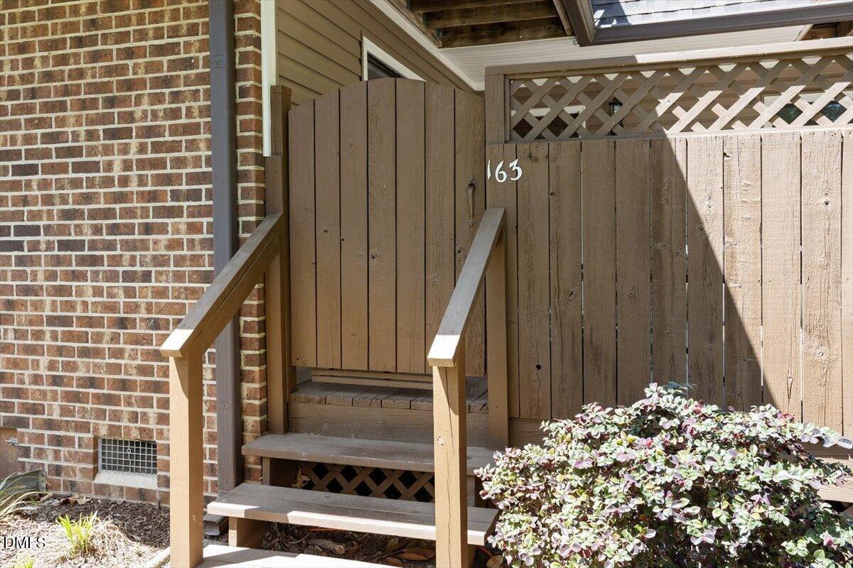 163 Springberry Lane Chapel Hill, NC 27517 - Photo 31 of 32 a view of a entryway door of the house