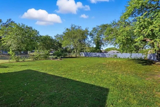 a view of a golf course with a garden