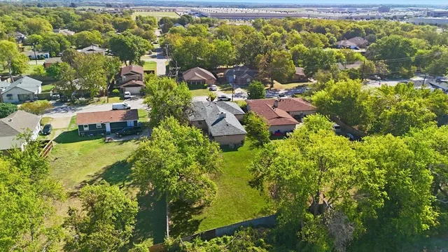 an aerial view of residential house with an outdoor space