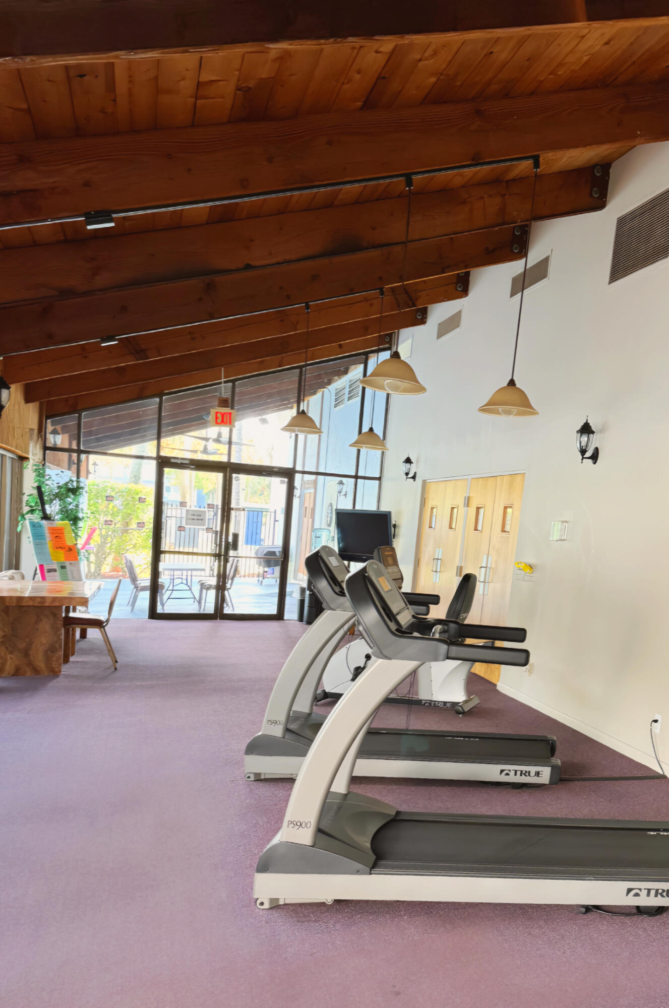 7664 Northwest 18th Street, Unit 103 Margate, FL 33063 - Photo 5 of 7 a view of gym with large windows