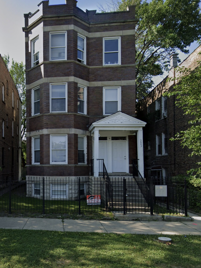 3839 West 14th Street, Unit 1 Chicago, IL 60623 - Photo 1 of 10 a front view of a house