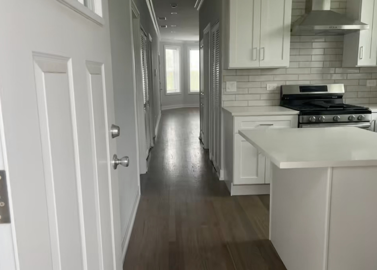 3839 West 14th Street, Unit 1 Chicago, IL 60623 - Photo 4 of 10 a kitchen with a refrigerator and a stove