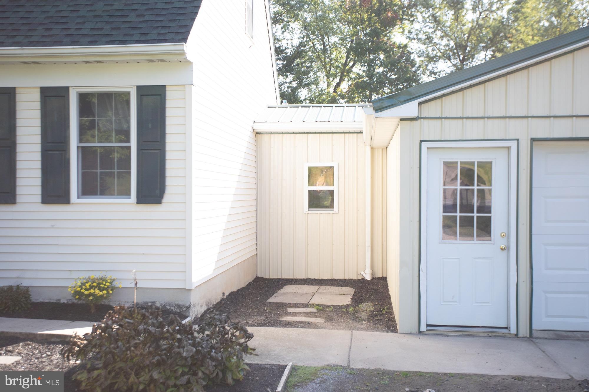 491 Cinder Road New Providence, PA 17560 - Photo 3 of 40 Mudroom between house & garage
