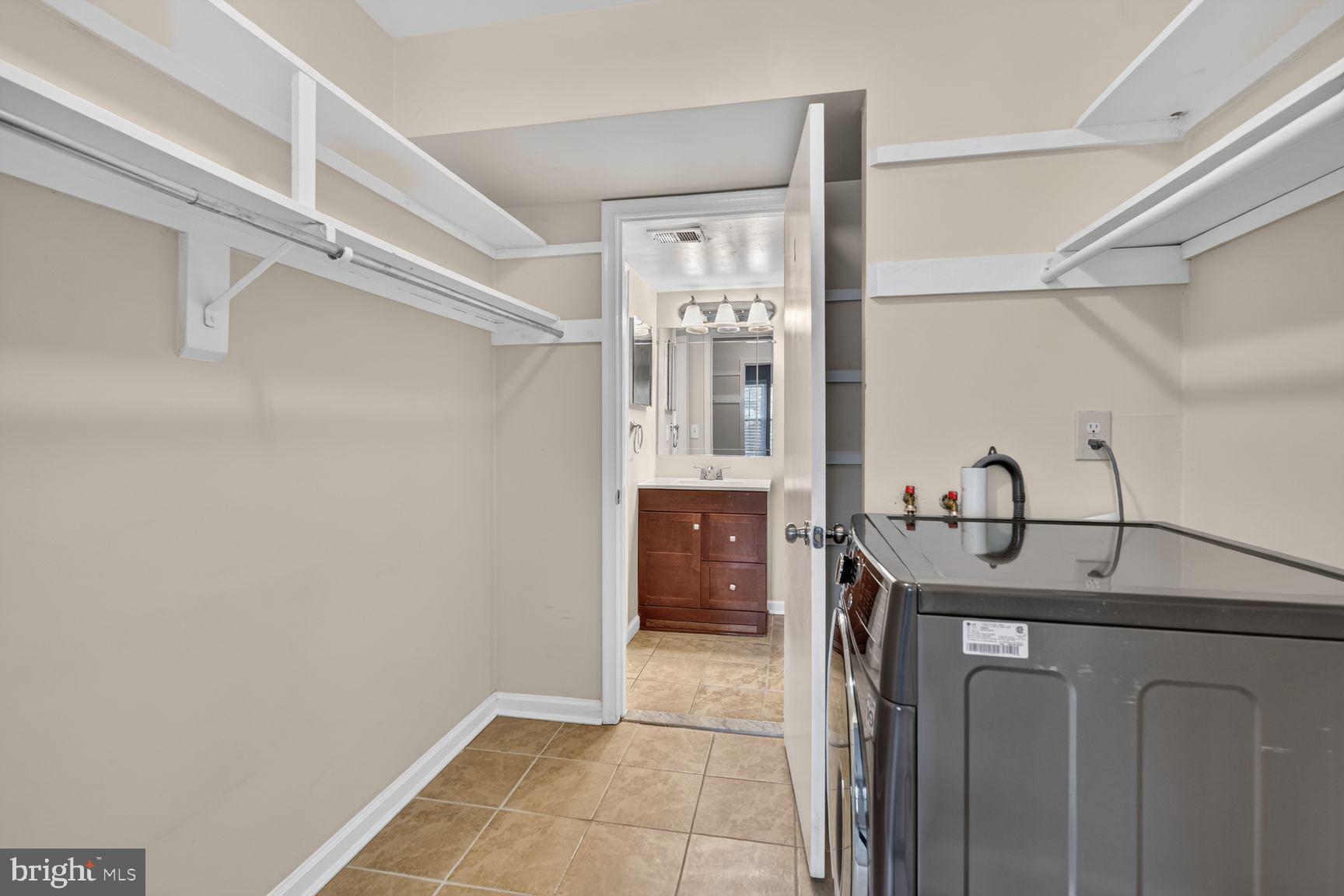 8358 K Dunham Court, Unit 627 Springfield, VA 22152 - Photo 12 of 15 Walk in closet & laundry