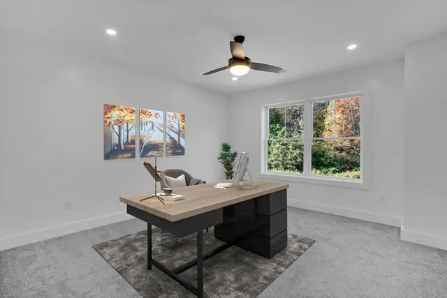 a workspace with furniture and window