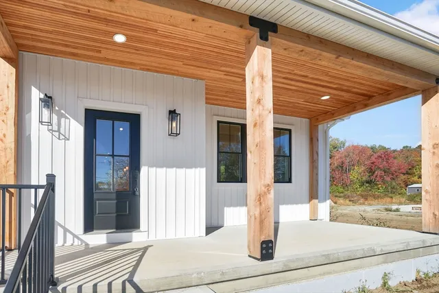a front view of a house with a porch