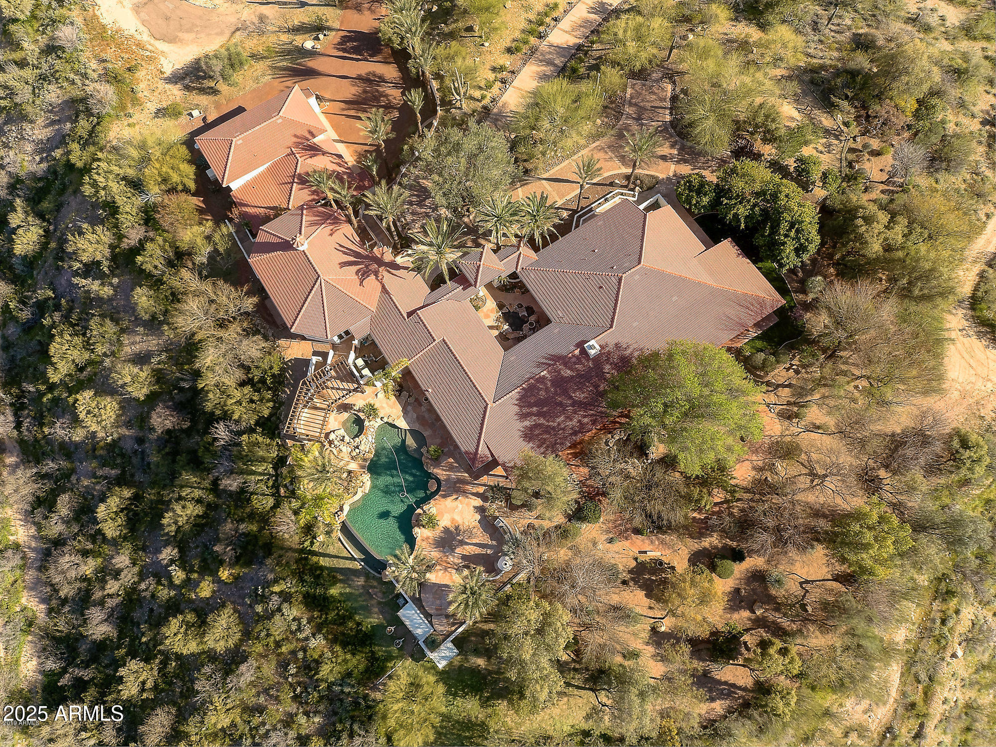 28331 West Rocking Horse Lane Morristown, AZ 85342 - Photo 2 of 22 a aerial view of a house with yard and covered with trees