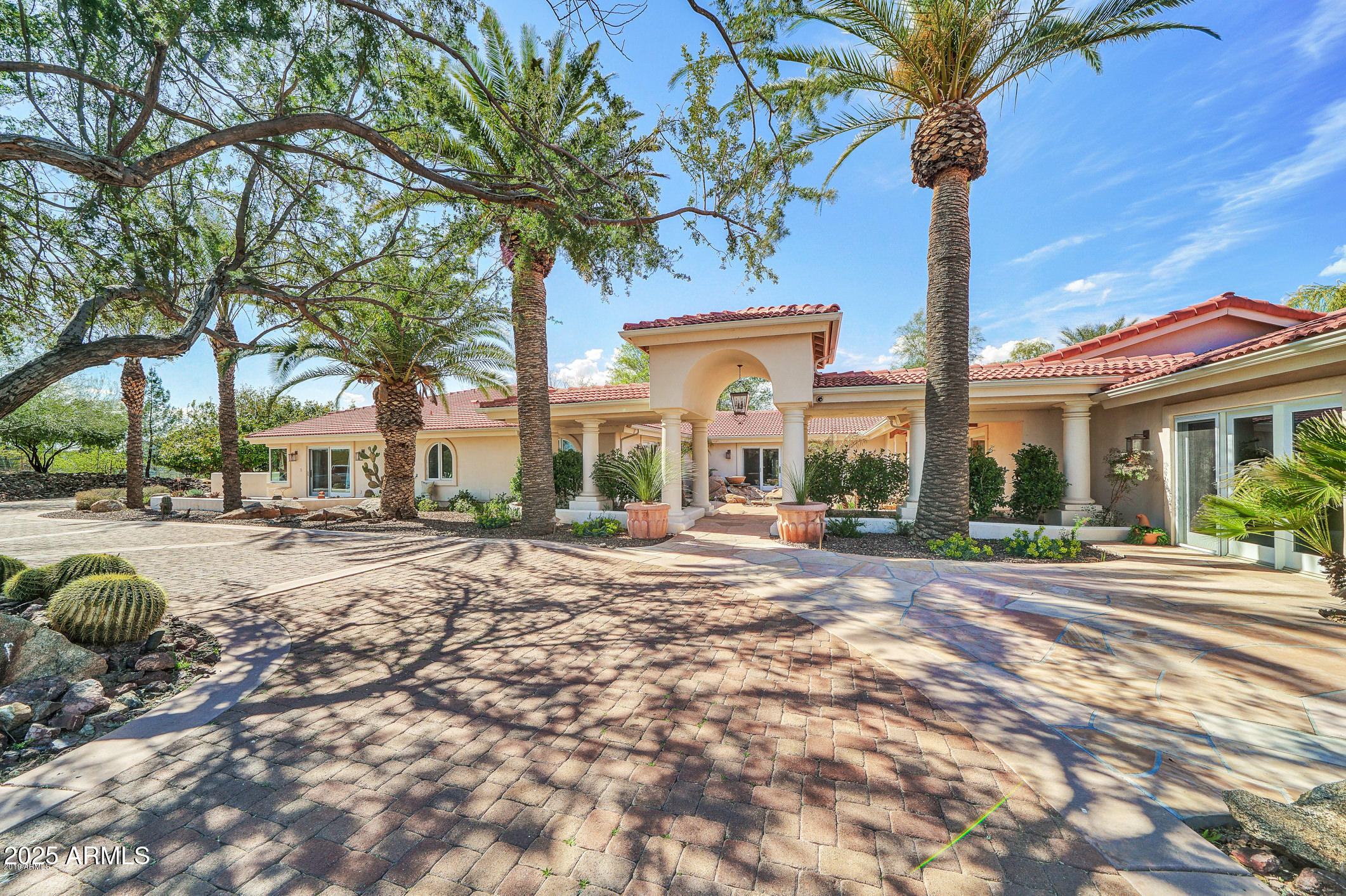 28331 West Rocking Horse Lane Morristown, AZ 85342 - Photo 3 of 22 a view of a house with a tree in front