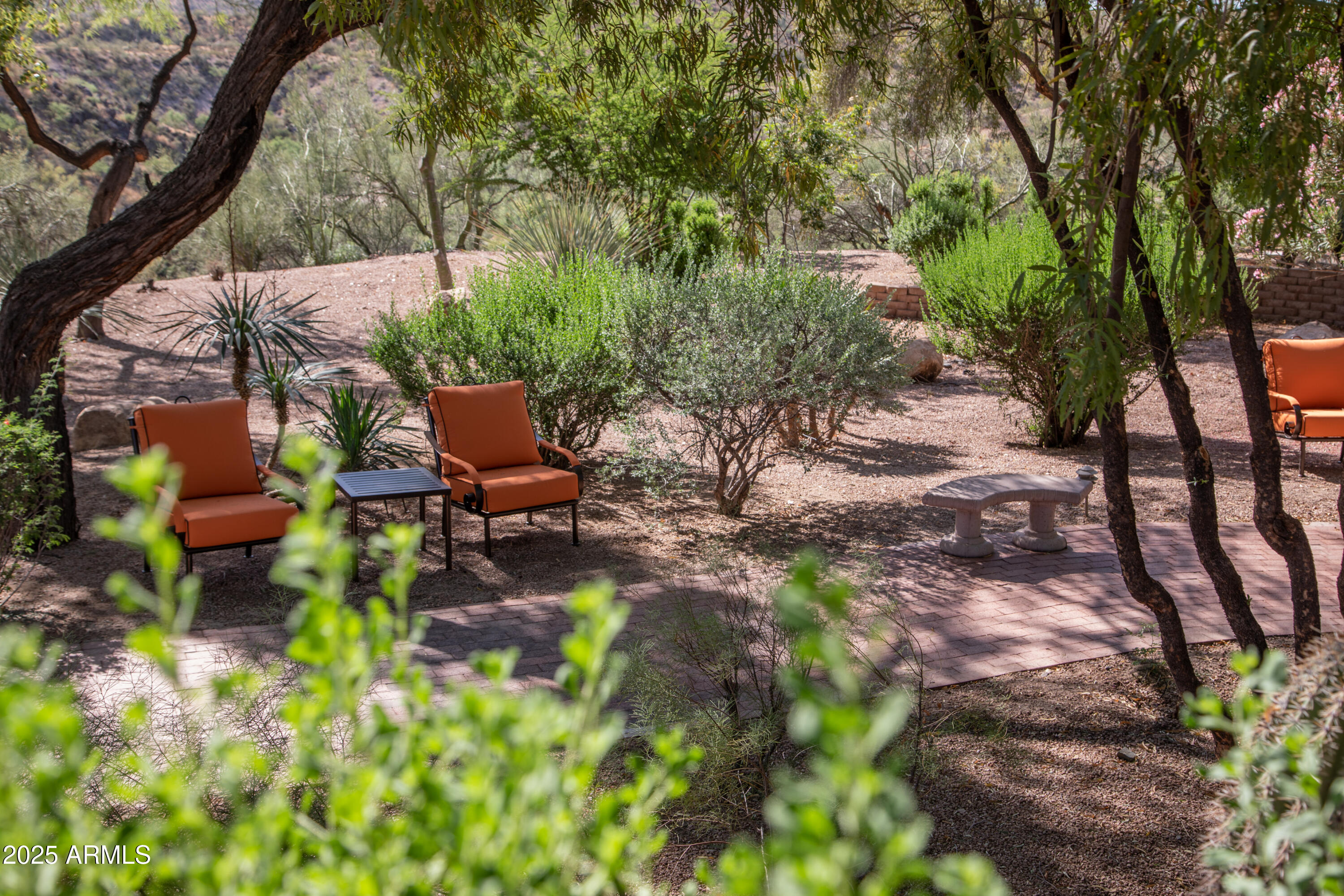 28331 West Rocking Horse Lane Morristown, AZ 85342 - Photo 5 of 22 a view of a backyard with sitting area