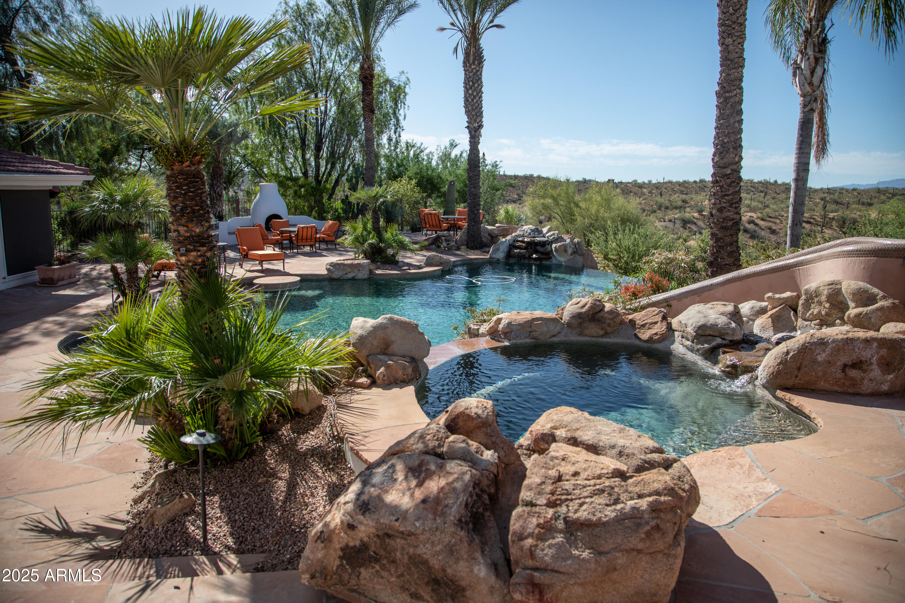 28331 West Rocking Horse Lane Morristown, AZ 85342 - Photo 6 of 22 a view of a lake with lawn chairs