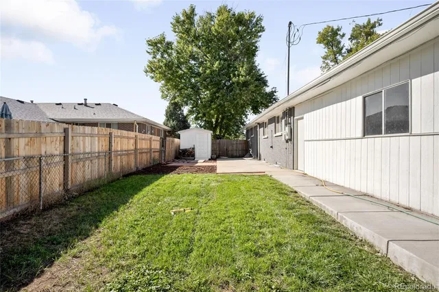 a view of a back yard of the house