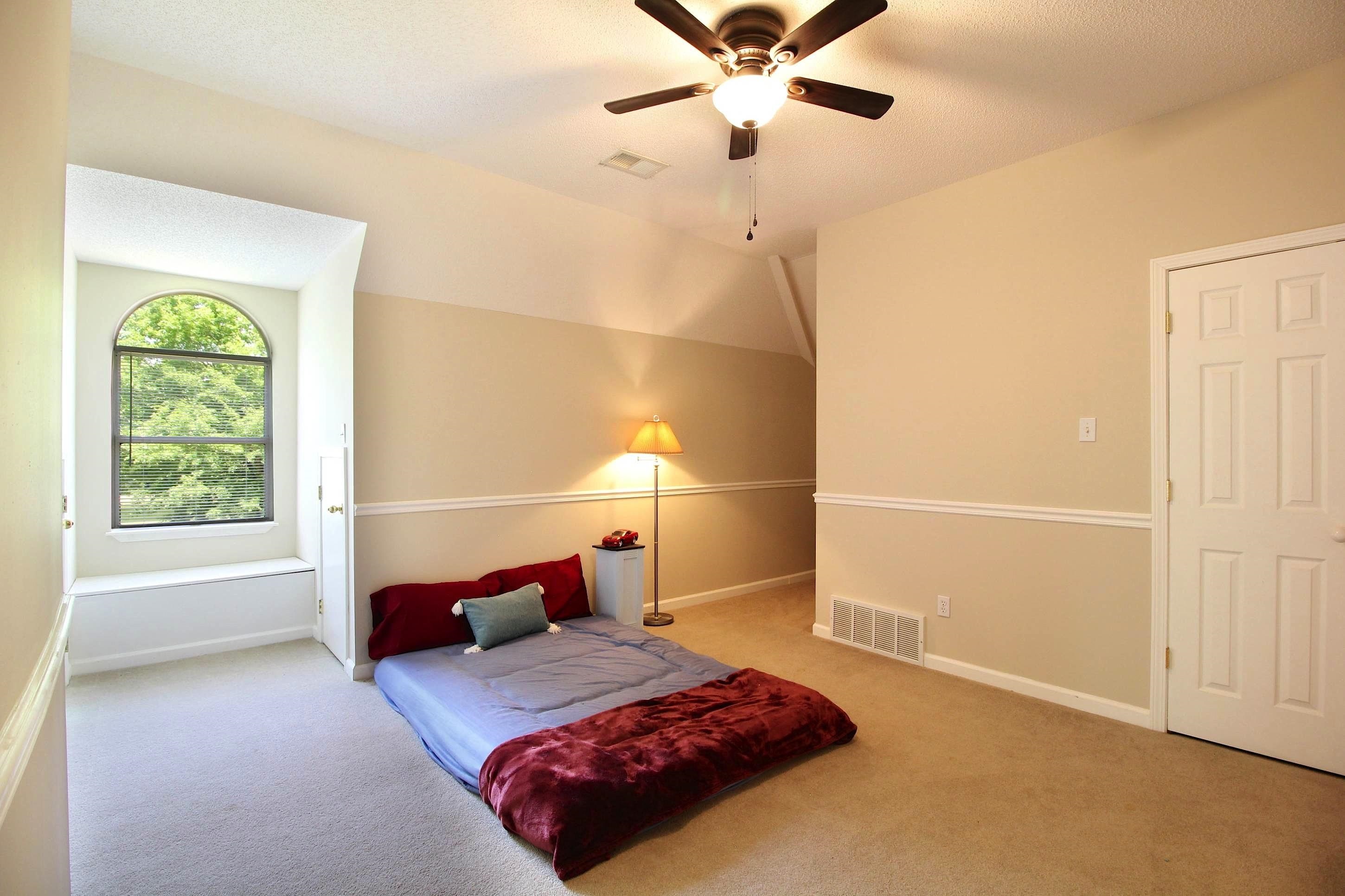 2550 North Reid Hooker Road Eads, TN 38028 - Photo 26 of 32 a bedroom with a bed and a window