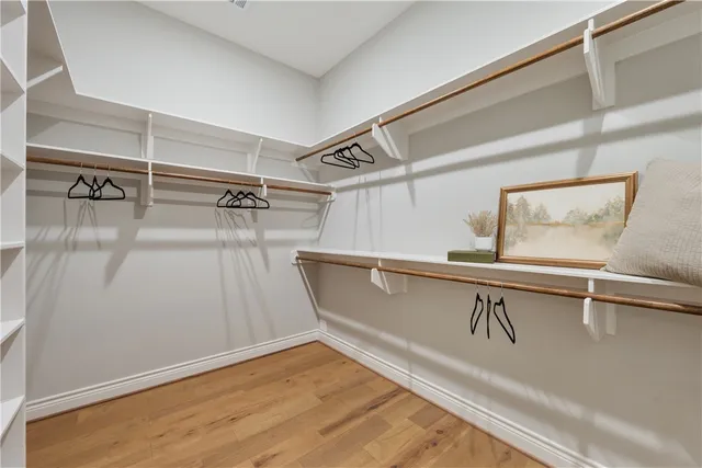 a view of a room with racks on the wall