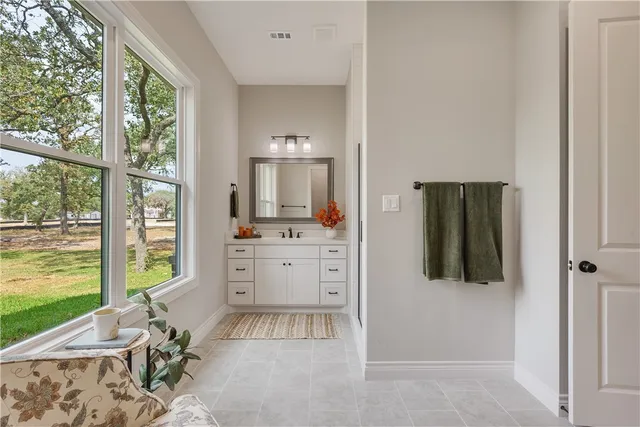 a room with a bed and a window