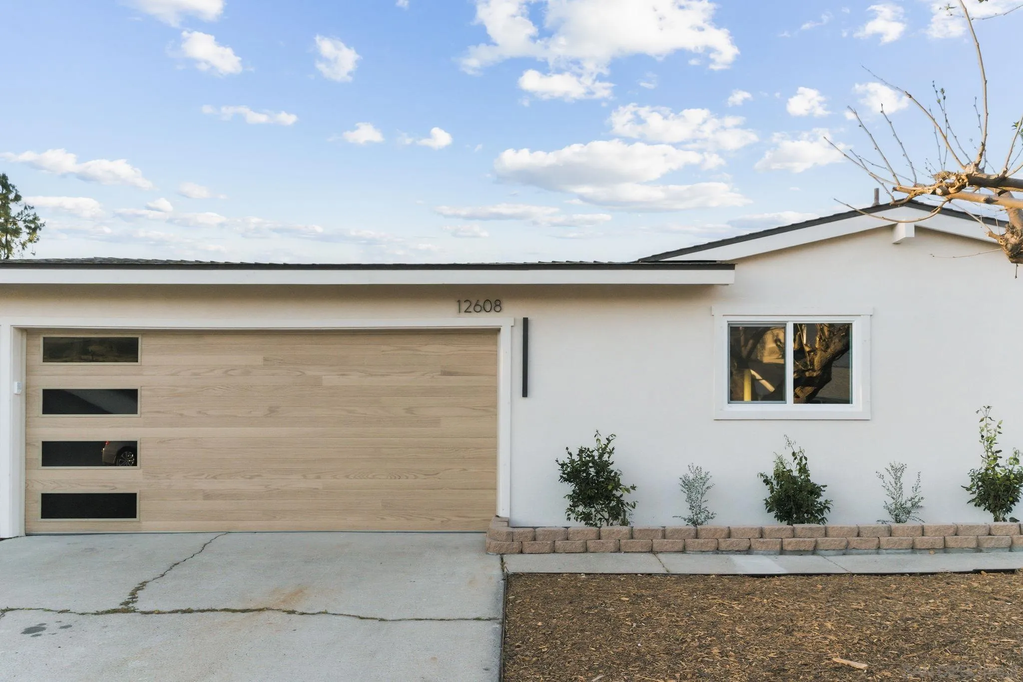 a front view of house with yard