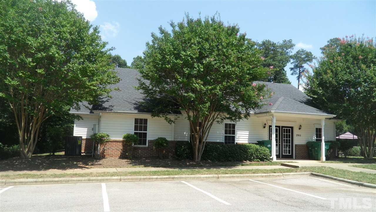 2830-102 Barrymore Street, Unit 102 Raleigh, NC 27603 - Photo 12 of 15 a front view of a house with a yard