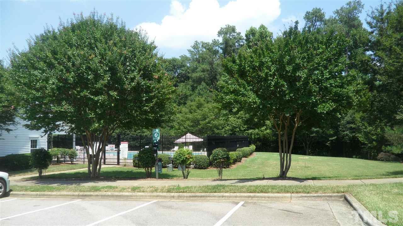 2830-102 Barrymore Street, Unit 102 Raleigh, NC 27603 - Photo 13 of 15 a view of a house with a backyard