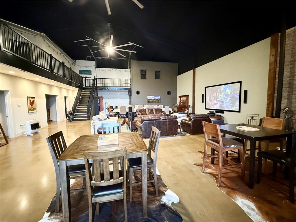 1211 VZ County Road Canton, TX 75103 - Photo 12 of 39 a view of a dining room with furniture and wooden floor