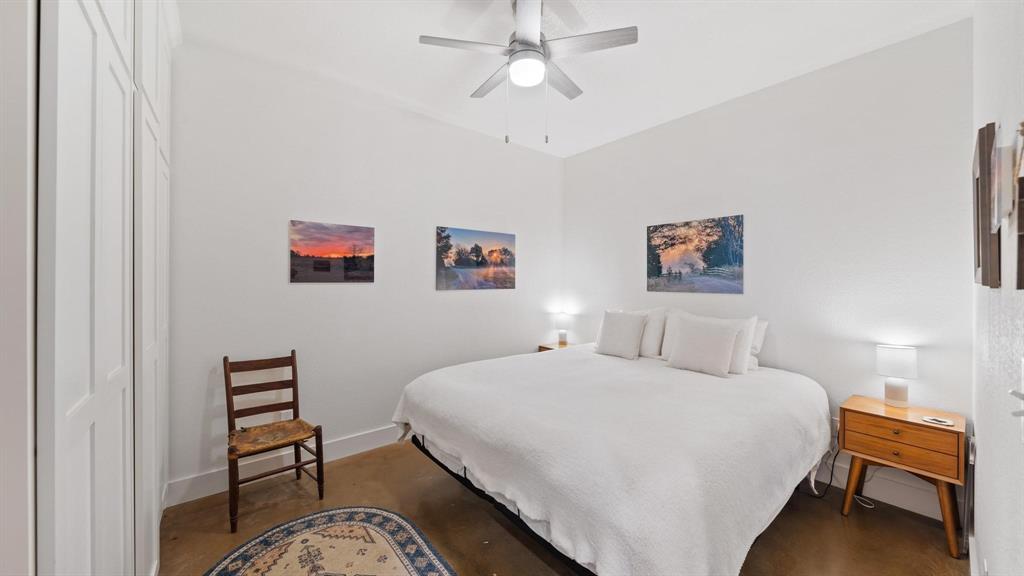 1211 VZ County Road Canton, TX 75103 - Photo 15 of 39 a bedroom with a bed and a bookshelf