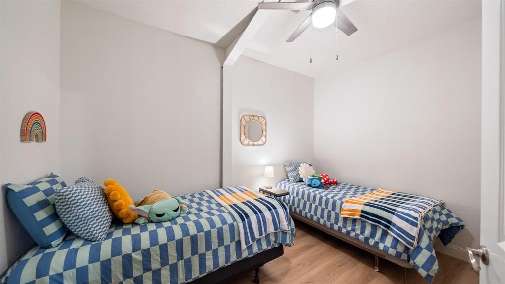 1211 VZ County Road Canton, TX 75103 - Photo 23 of 39 a bedroom with bed and a chandelier