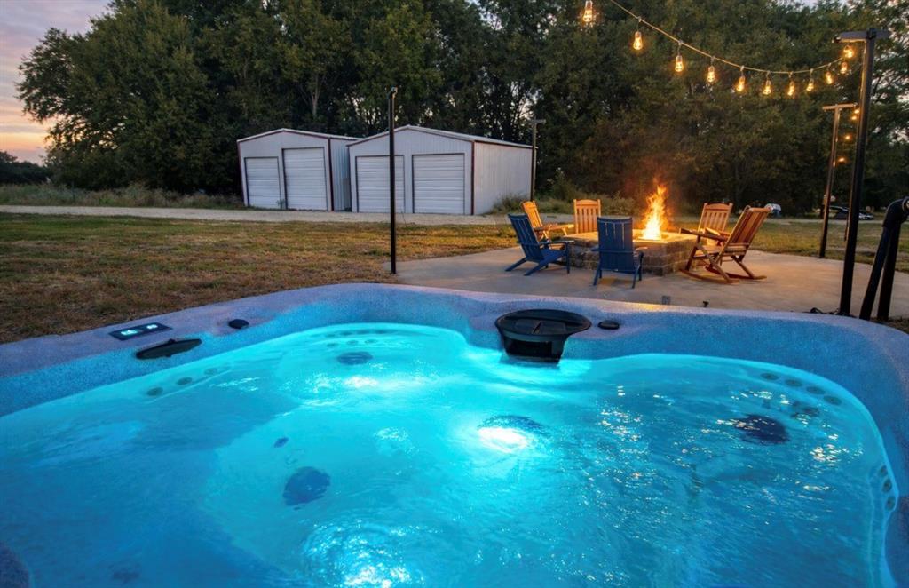 1211 VZ County Road Canton, TX 75103 - Photo 28 of 39 a backyard of a house with table and chairs