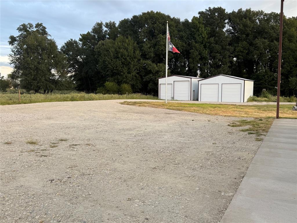 1211 VZ County Road Canton, TX 75103 - Photo 29 of 39 a view of a dry yard with brick wall and covered with snow