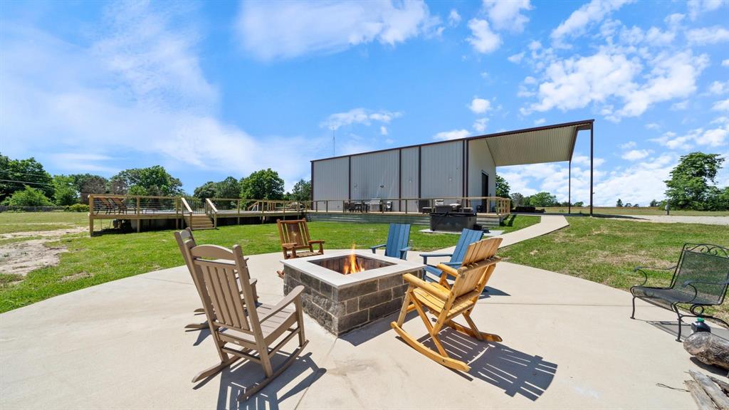 1211 VZ County Road Canton, TX 75103 - Photo 6 of 39 a view of a chairs and backyard with a slide