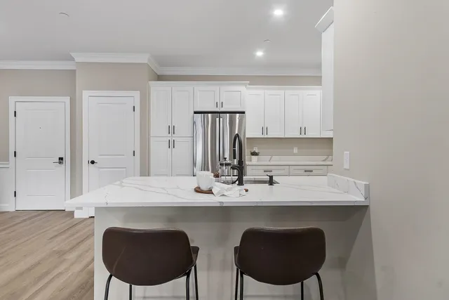 $419,900 | 10100 South Willow Street, Unit 107, Manchester, NH 03109