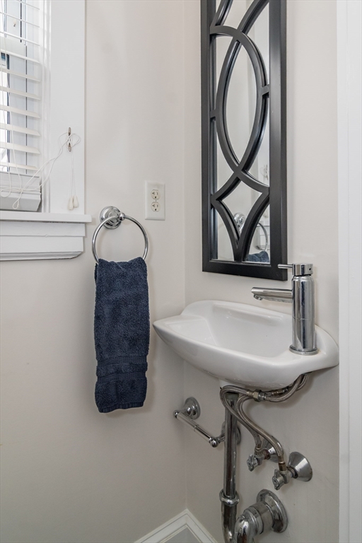 5 Hillcrest Road Framingham, MA 01702 - Photo 15 of 30 a bathroom with a sink and a mirror