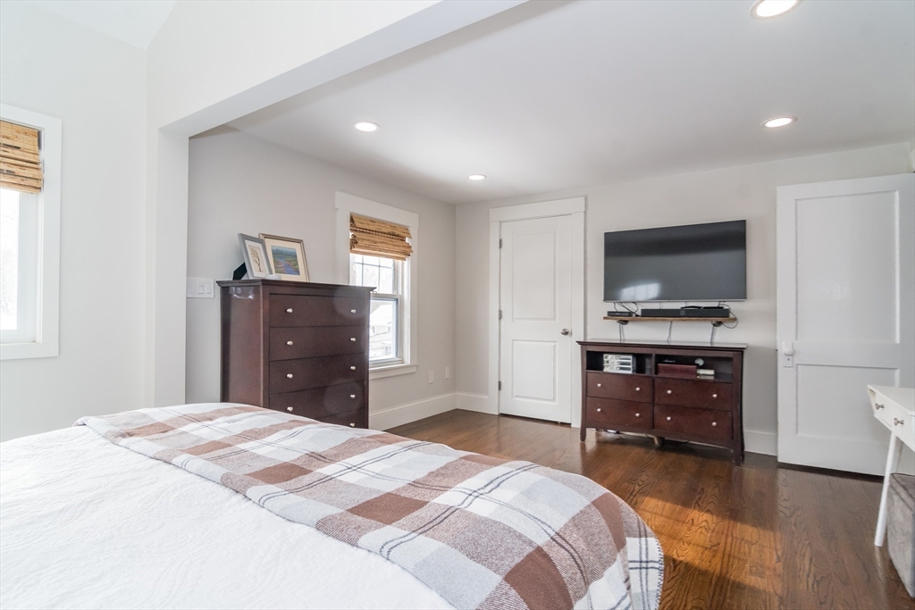 5 Hillcrest Road Framingham, MA 01702 - Photo 18 of 30 a bedroom with a bed and a flat screen tv