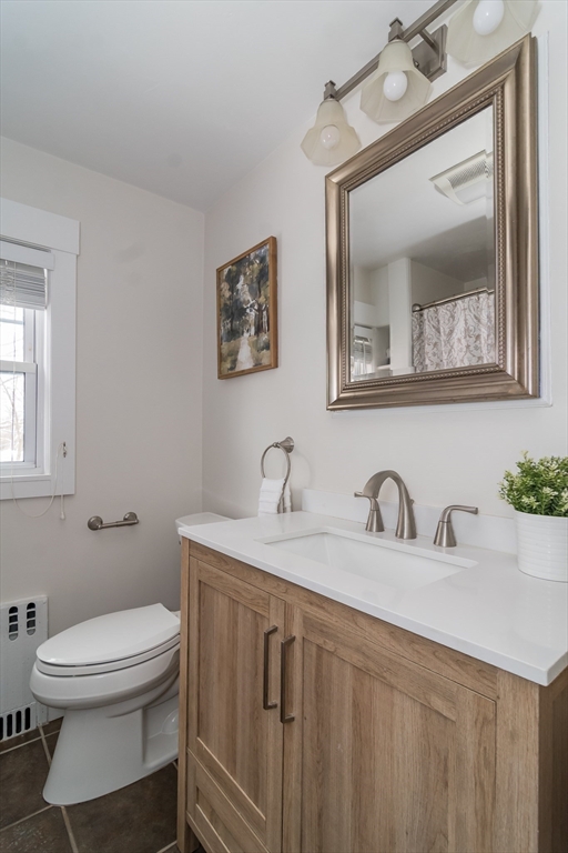5 Hillcrest Road Framingham, MA 01702 - Photo 19 of 30 a bathroom with a toilet a sink and mirror