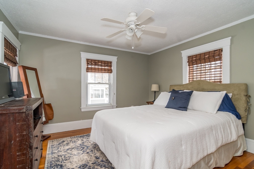 5 Hillcrest Road Framingham, MA 01702 - Photo 20 of 30 a bedroom with a large bed and a window