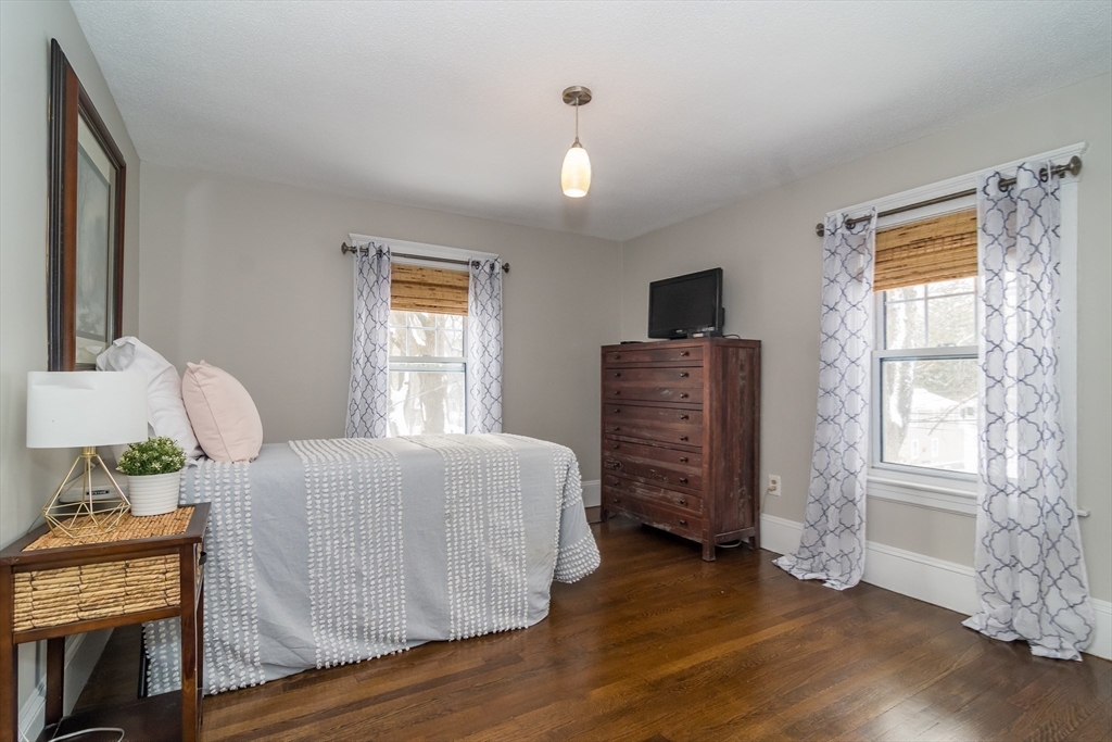 5 Hillcrest Road Framingham, MA 01702 - Photo 21 of 30 a bedroom with a bed dresser and a window